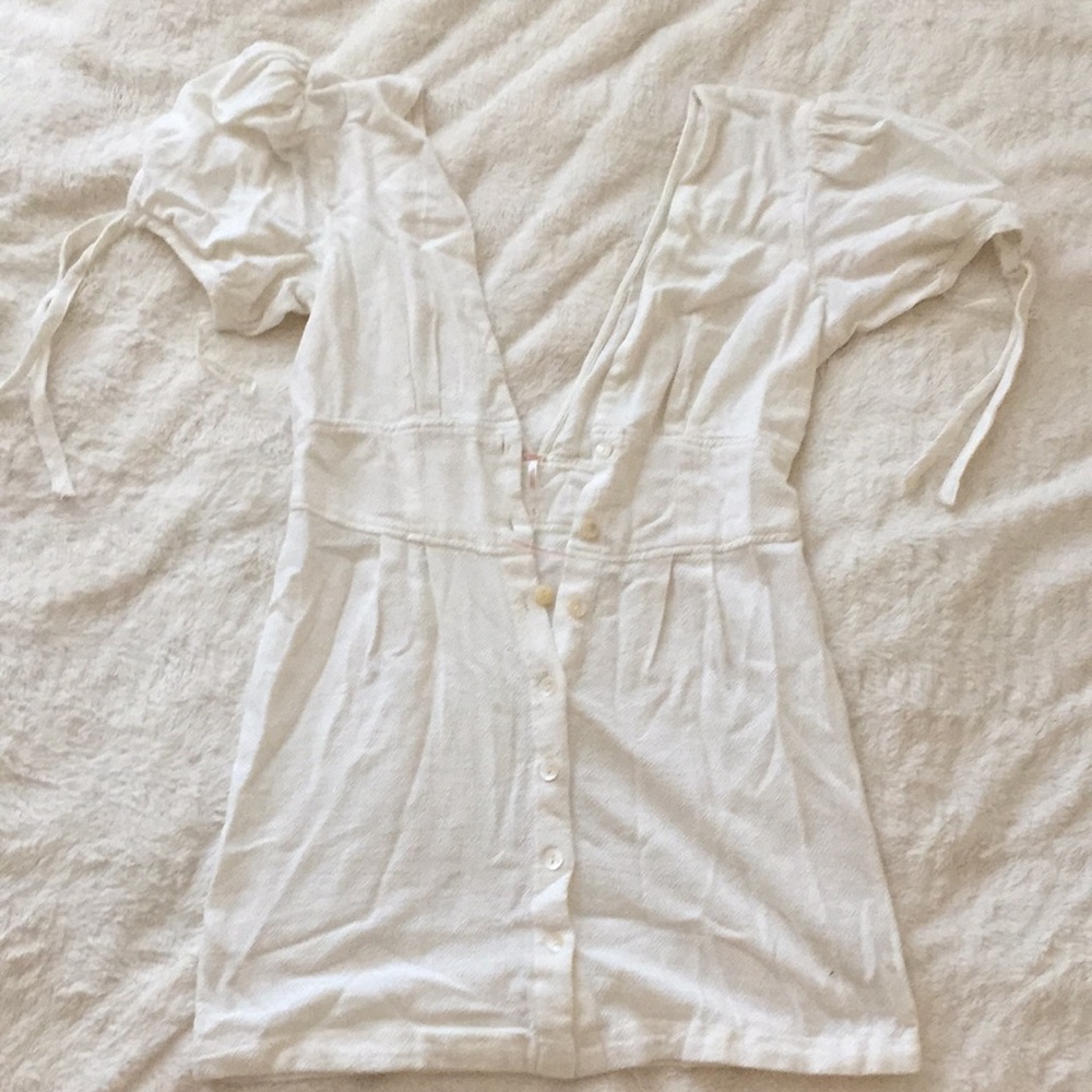Free people white mini dress. V neck v back